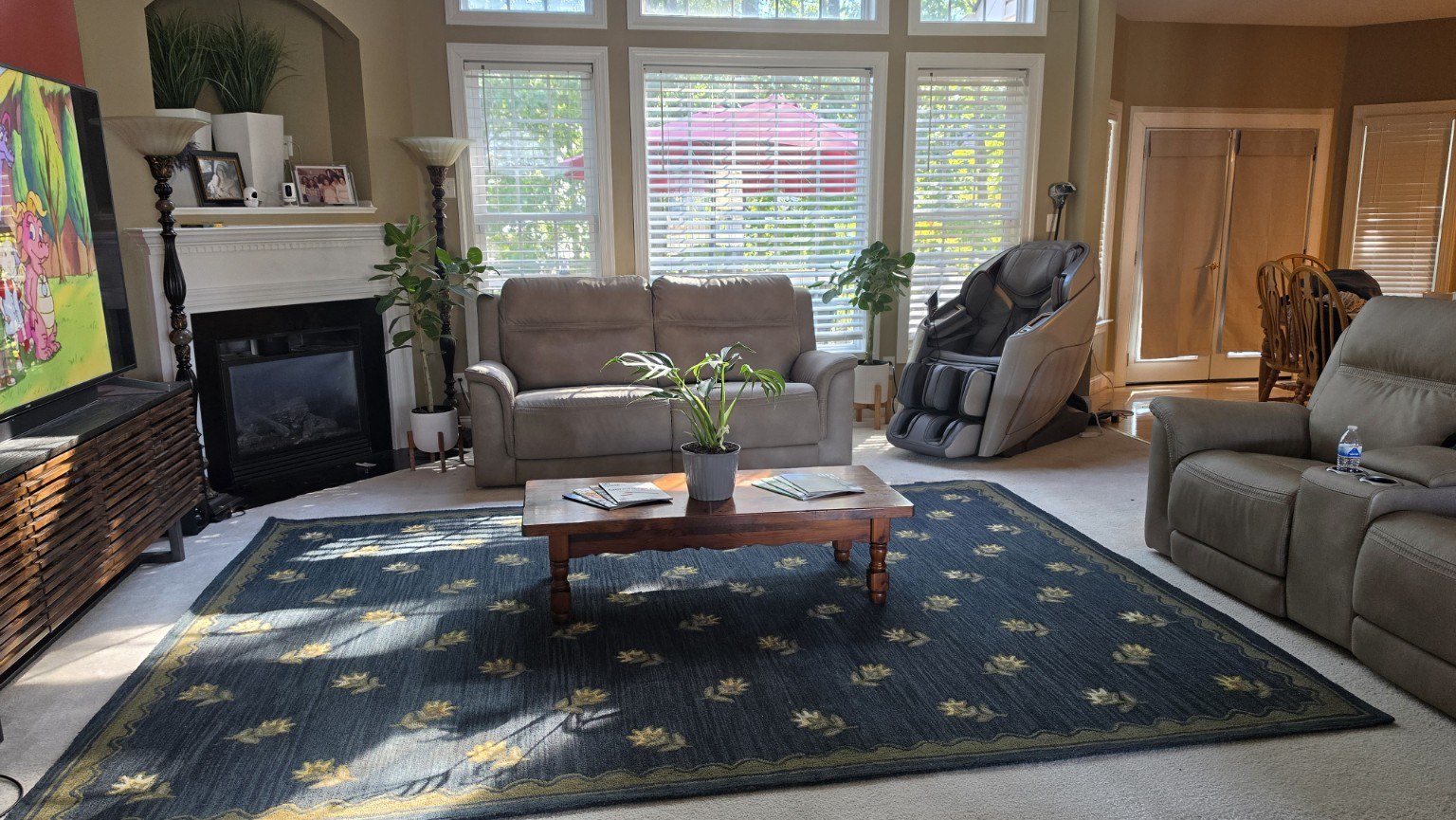 Submitted application photo of a family room with a fireplace